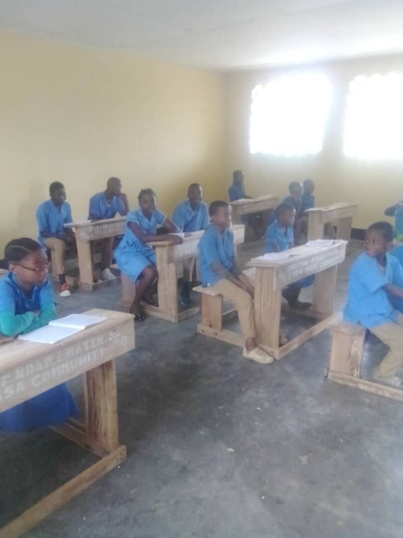 Pupils at their desks in a Ngonga classroom