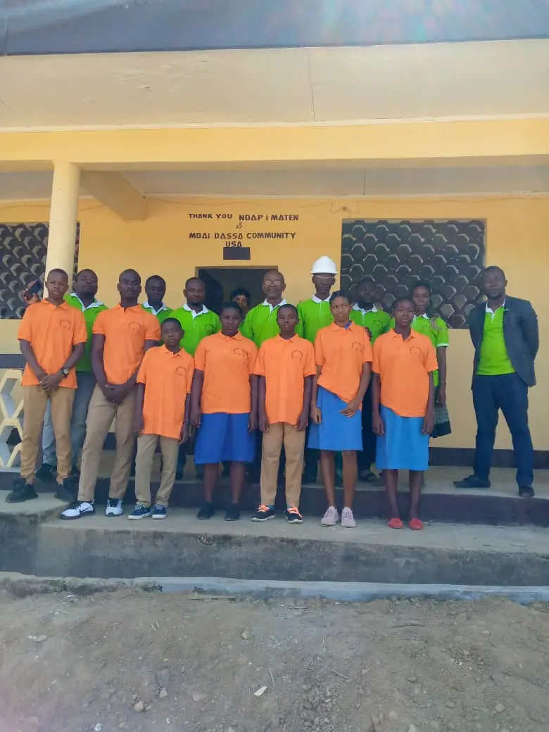 Pupils and members of Ndap I Maten in front of the renovated Ngonga school